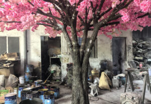 Hand-sculpted trunk of a custom artificial cherry blossom tree